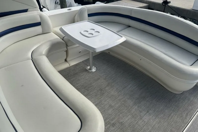 Patry-sea Yacht Photos Pics Luxurious seating area on 2005 Sea Ray 420 Sundancer yacht with table.