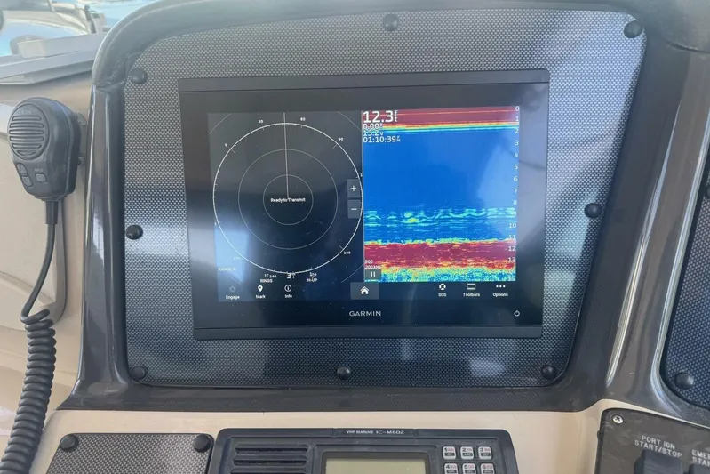 Patry-sea Yacht Photos Pics Garmin marine display on 2005 Sea Ray 420 Sundancer dashboard with sonar and radar.