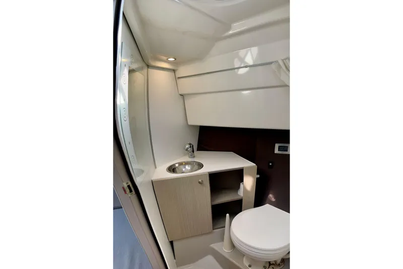  Yacht Photos Pics 2012 Cranchi Endurance 30 bathroom interior with sink and toilet.