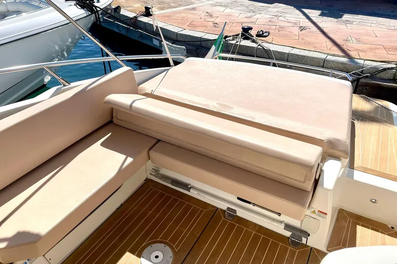  Yacht Photos Pics Luxurious seating on 2012 Cranchi Endurance 30 yacht with wooden deck.