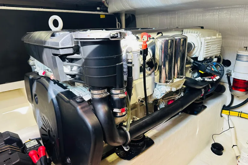 Encore Yacht Photos Pics Engine compartment of a 2017 Sabre 42 Salon Express, showcasing detailed mechanical components.