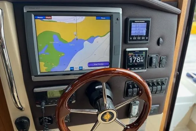 Mystic Yacht Photos Pics 2014 Ranger Tugs R-31 helm with navigation display and controls.