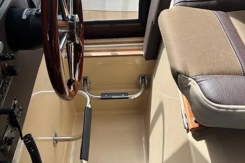 Mystic Yacht Photos Pics 2014 Ranger Tugs R-31 helm station with steering wheel and seat detail.