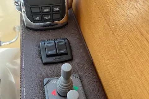 Mystic Yacht Photos Pics Control panel of 2014 Ranger Tugs R-31 boat with joystick and switches.