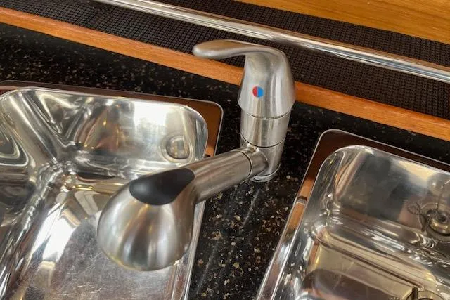 Mystic Yacht Photos Pics Stainless steel sink and faucet in 2014 Ranger Tugs R-31 boat kitchen.