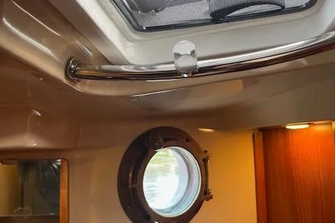 Mystic Yacht Photos Pics Interior view of 2014 Ranger Tugs R-31 with porthole and ceiling hatch.
