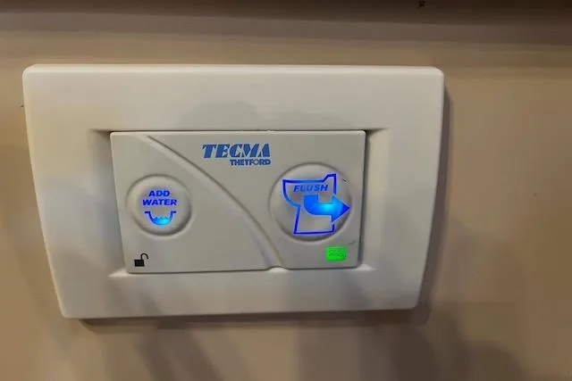 Mystic Yacht Photos Pics Control panel for Tecma Thetford toilet on 2014 Ranger Tugs R-31 boat.