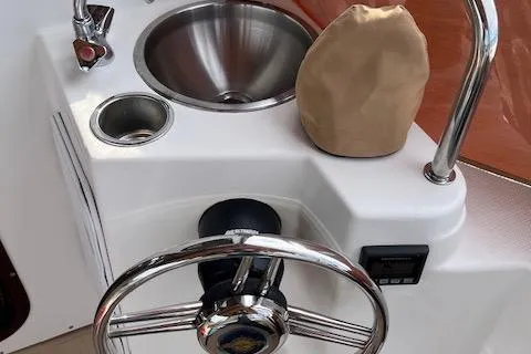 Mystic Yacht Photos Pics 2014 Ranger Tugs R-31 helm with sink and steering wheel.