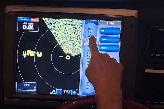 Mystic Yacht Photos Pics Touchscreen navigation system on a 2014 Ranger Tugs R-31 boat, displaying radar and gain controls.