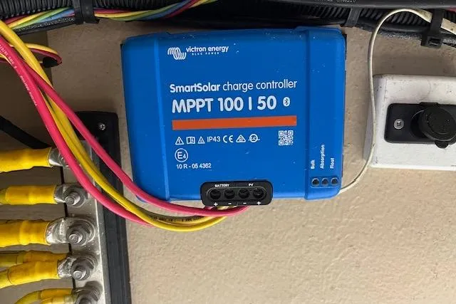 Mystic Yacht Photos Pics Victron Energy SmartSolar charge controller in 2014 Ranger Tugs R-31 boat, with connected wiring.