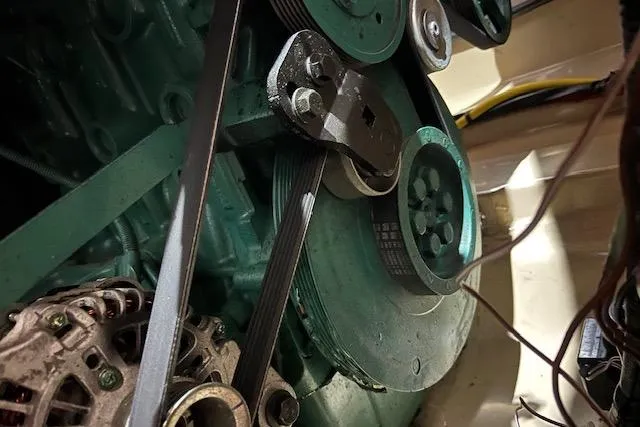 Mystic Yacht Photos Pics Engine components of a 2014 Ranger Tugs R-31 boat, featuring belts and pulleys.