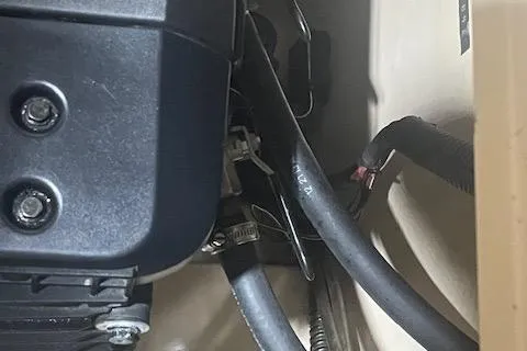 Mystic Yacht Photos Pics Engine compartment of 2014 Ranger Tugs R-31 with visible hoses and components.