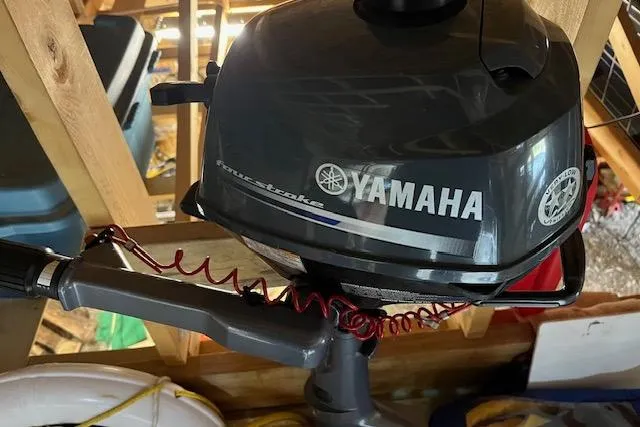 Mystic Yacht Photos Pics Yamaha outboard motor on 2014 Ranger Tugs R-31, stored in wooden shed.