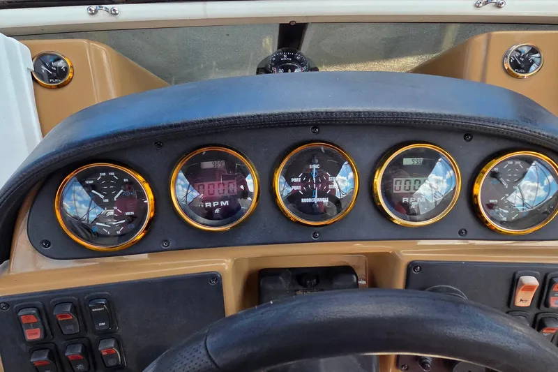 All In Yacht Photos Pics Dashboard of 2004 Carver 444 Cockpit Motor Yacht with gauges and controls.