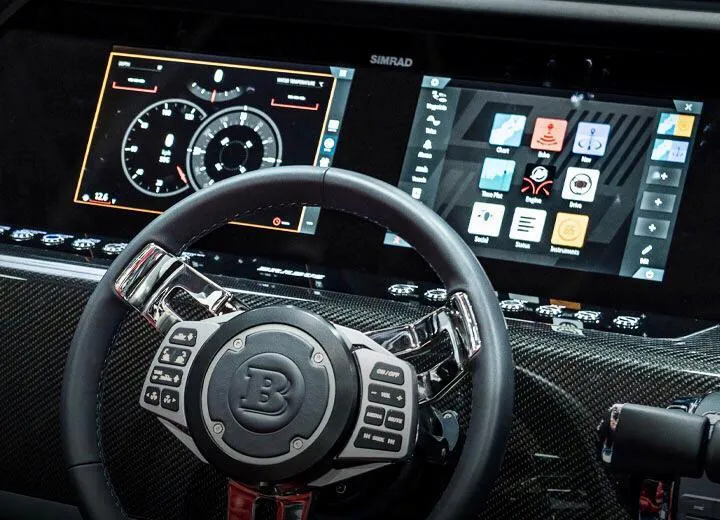  Yacht Photos Pics Steering wheel and dashboard of 2022 Axopar Brabus Shadow 900 ST boat.