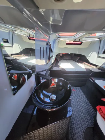  Yacht Photos Pics Interior of 2022 Axopar Brabus Shadow 900 ST, featuring modern design and sleek black sink.