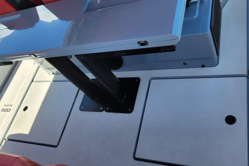  Yacht Photos Pics 2022 Axopar Brabus Shadow 900 ST deck with sleek table and seating.