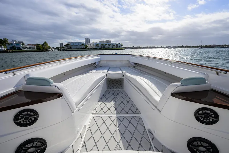  Yacht Photos Pics 2021 HCB 53 Sueños boat interior with luxurious seating and waterfront view.