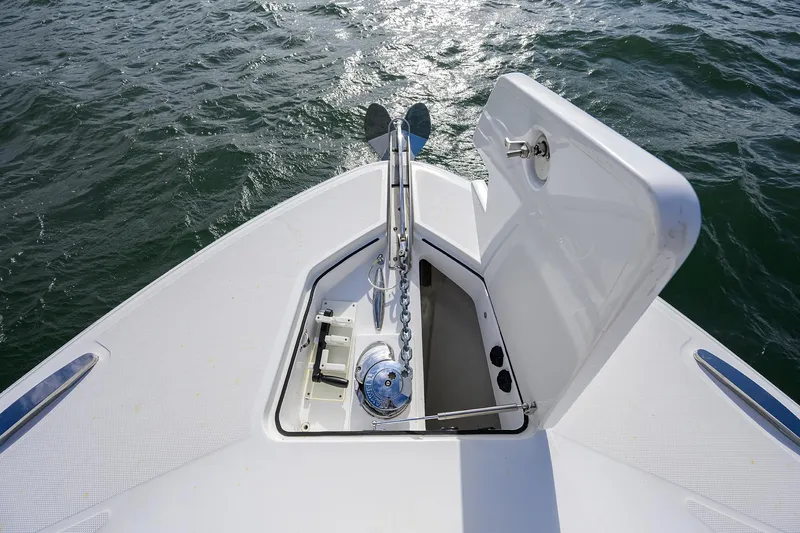  Yacht Photos Pics 2021 HCB 53 Sueños boat anchor compartment open on calm water.