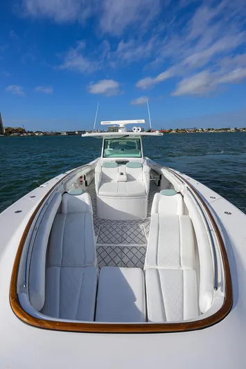  Yacht Photos Pics 2021 HCB 53 Sueños boat on water, featuring spacious deck and luxurious seating.