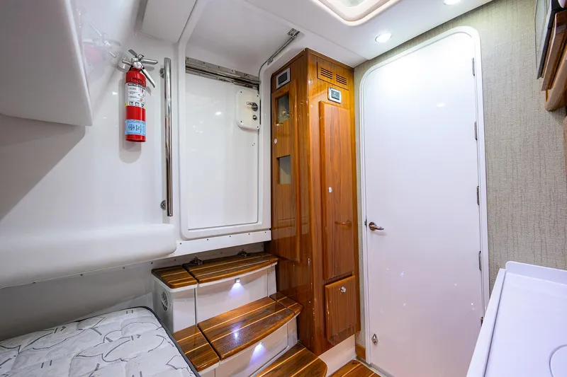  Yacht Photos Pics Luxurious interior of 2021 HCB 53 Sueños yacht with wooden accents and modern design.