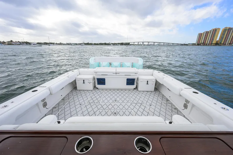  Yacht Photos Pics HCB 53 Sueños 2021 boat deck with ocean view and city skyline.