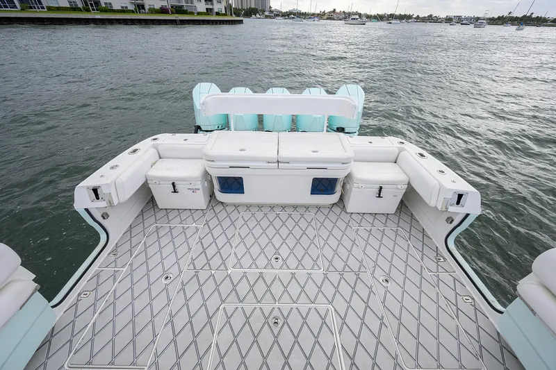 Yacht Photos Pics Spacious deck of 2021 HCB 53 Sueños boat on water.