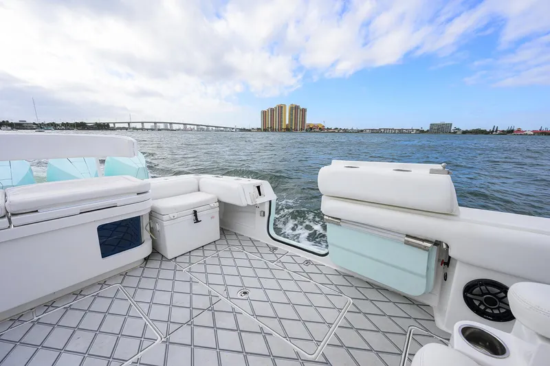  Yacht Photos Pics HCB 53 Sueños 2021 boat interior with ocean view and city skyline.