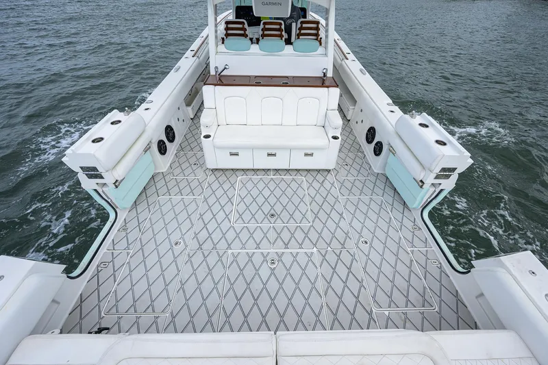  Yacht Photos Pics Spacious deck of 2021 HCB 53 Sueños boat on water.