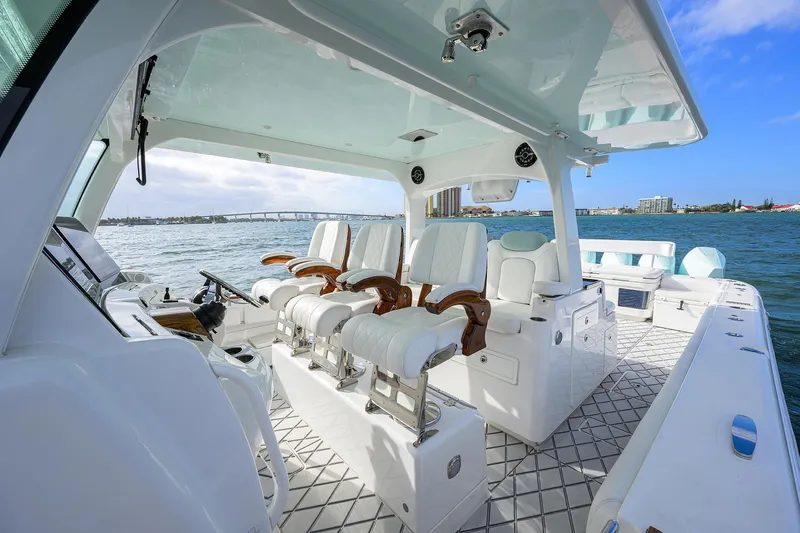  Yacht Photos Pics Luxurious 2021 HCB 53 Sueños boat interior with plush seating and ocean view.