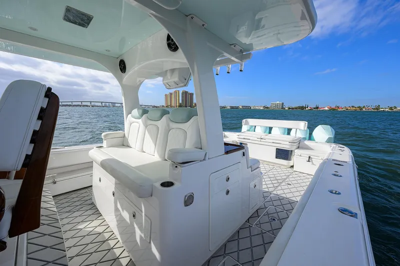 Yacht Photos Pics Luxury 2021 HCB 53 Sueños boat interior with white seating on open water.