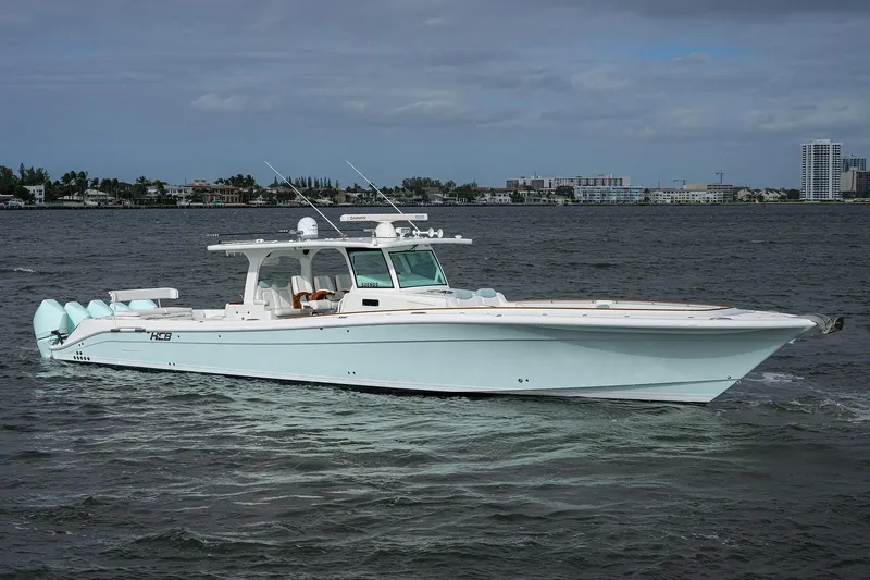  Yacht Photos Pics 2021 HCB 53 Sueños luxury boat cruising on open water.