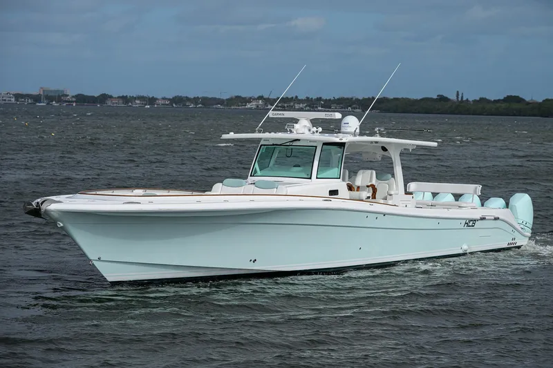  Yacht Photos Pics 2021 HCB 53 Sueños boat cruising on open water.