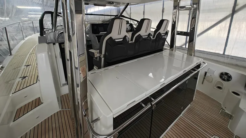  Yacht Photos Pics 2021 Jeanneau CAP CAMARAT 12.5WA interior with sleek seating and modern design.