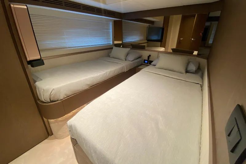  Yacht Photos Pics Luxurious twin cabin interior of 2025 Azimut Magellano 66 yacht.