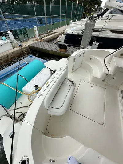  Yacht Photos Pics 2009 Sea Ray 36 Sedan Bridge docked, showing spacious deck and seating area.