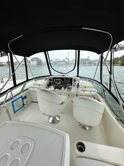 Yacht Photos Pics 2009 Sea Ray 36 Sedan Bridge helm with dual seats and panoramic water view.