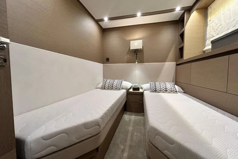  Yacht Photos Pics Luxurious twin cabin interior of 2017 Prestige 680 yacht with modern decor.