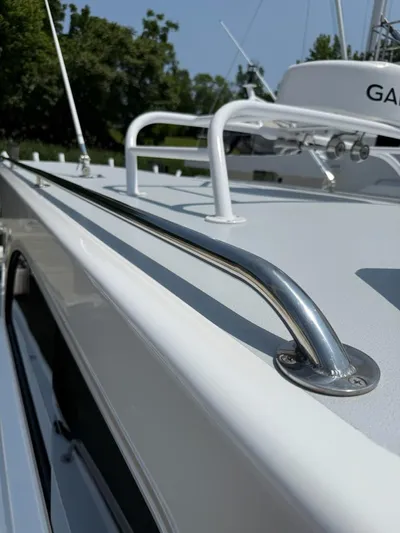 Outcast Yacht Photos Pics Close-up of a 2004 Mabry 40 boat's sleek railing and deck details.