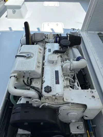 Outcast Yacht Photos Pics Mabry 40 engine, 2004 model, featuring a clean and well-maintained design in a marine setting.