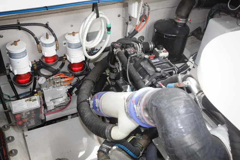 Baby Pie Yacht Photos Pics Engine room of 2016 Sea Ray 470 Sundancer with visible filters and hoses.