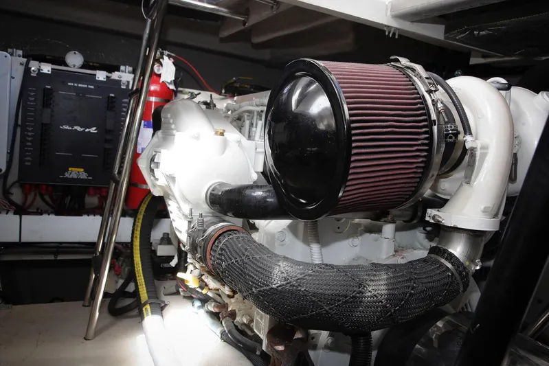 Baby Pie Yacht Photos Pics Engine room of 2016 Sea Ray 470 Sundancer, featuring air filter and mechanical components.