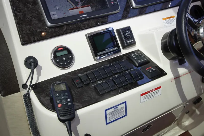 Baby Pie Yacht Photos Pics Control panel of 2016 Sea Ray 470 Sundancer yacht with navigation and communication equipment.