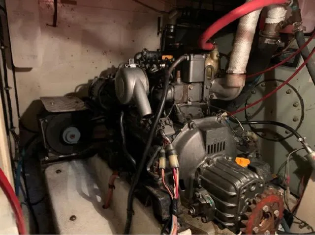  Yacht Photos Pics Engine room of 1990 Grand Banks 36 Europa with visible machinery and wiring.