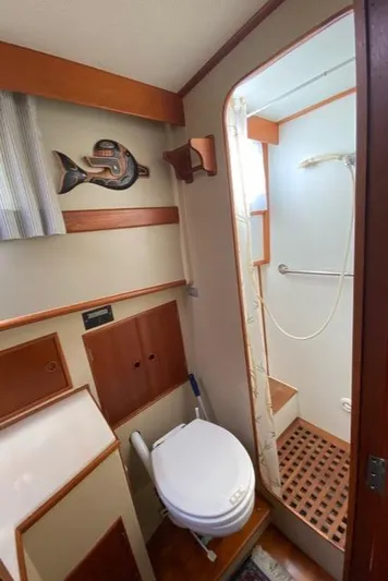 Yacht Photos Pics Bathroom interior of 1990 Grand Banks 36 Europa yacht with shower and toilet.