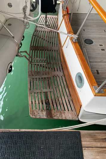  Yacht Photos Pics 1990 Grand Banks 36 Europa boat with wooden deck and swim platform.