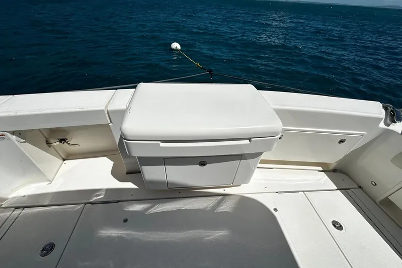  Yacht Photos Pics Riviera 43 Flybridge 2012 boat deck with storage compartment, ocean view.