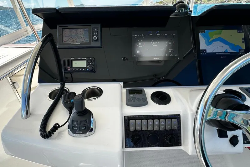  Yacht Photos Pics Control panel of 2012 Riviera 43 Flybridge yacht with navigation and communication equipment.