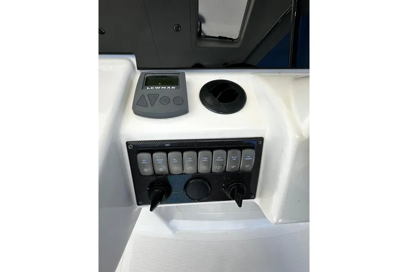  Yacht Photos Pics Control panel of 2012 Riviera 43 Flybridge with Lewmar display and switches.