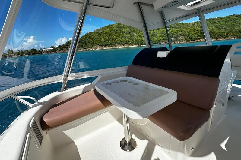  Yacht Photos Pics Luxurious interior of 2012 Riviera 43 Flybridge yacht with scenic ocean view.